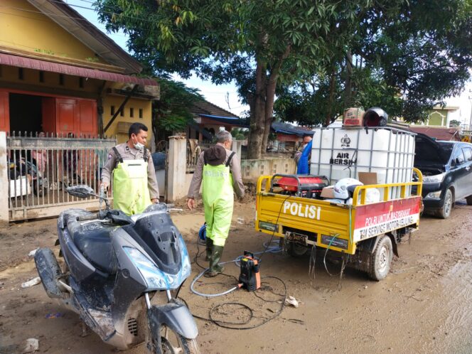 
					Bantu Pemulihan Pascabanjir, Polres Aceh Tamiang Berikan Servis dan Cuci Motor Gratis untuk Warga Terdampak Banjir
