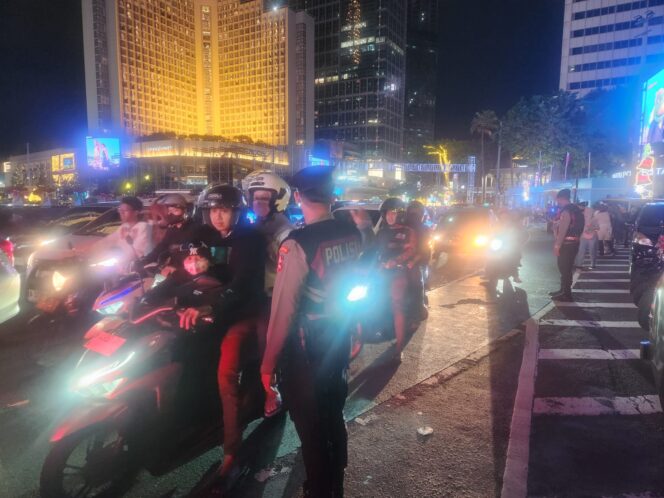 
					Pospam Nataru Bundaran HI Optimalkan Pengaturan Lalin di MH Thamrin