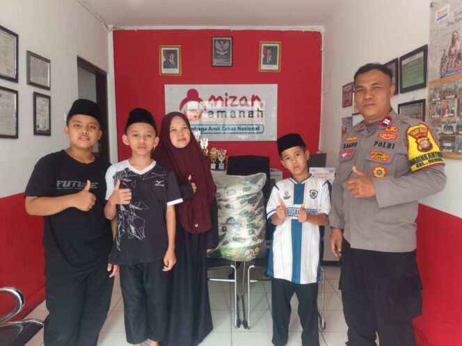 
					Bhabinkamtibmas Benhil Salurkan Bantuan Sosial Berupa Beras ke Panti Asuhan