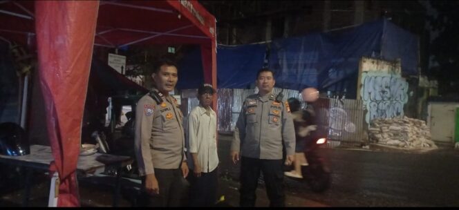 
					Patroli Sinergis Polisi–Warga Amankan Perbatasan Kalipasir Menteng