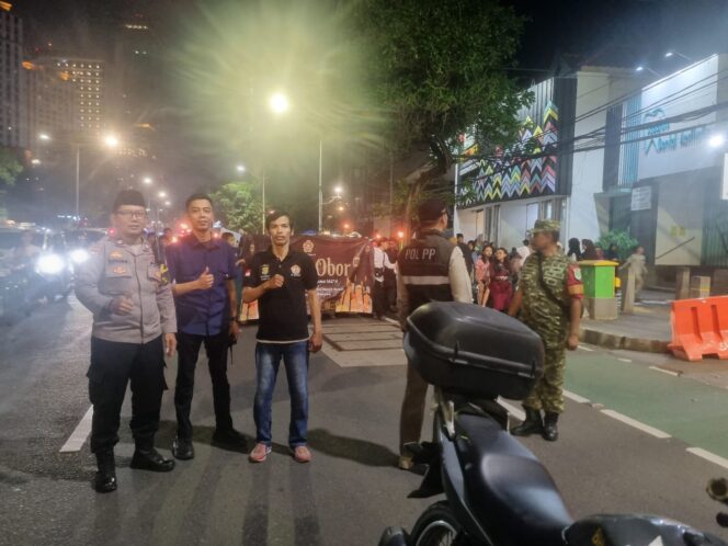 
					Sinergi Tiga Pilar dan Warga Karet Tengsin Gelar Pawai Obor Sambut Ramadan 1447 H