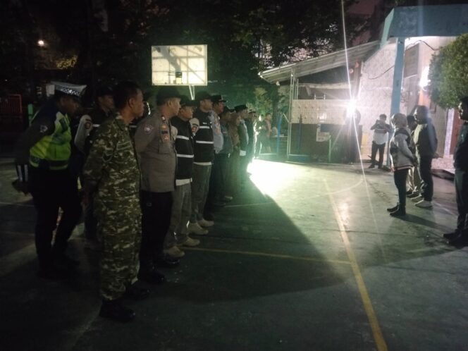 
					Tiga Pilar Kebon Kacang Kawal Pemasangan Cansteen di Putaran Jalan Masabi, Penataan Lalu Lintas Diperkuat