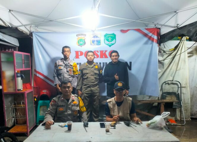 
					Pemantauan Posko Anti Tawuran di Kramat Pulo, Aparat Pastikan Situasi Aman Meski Diguyur Hujan