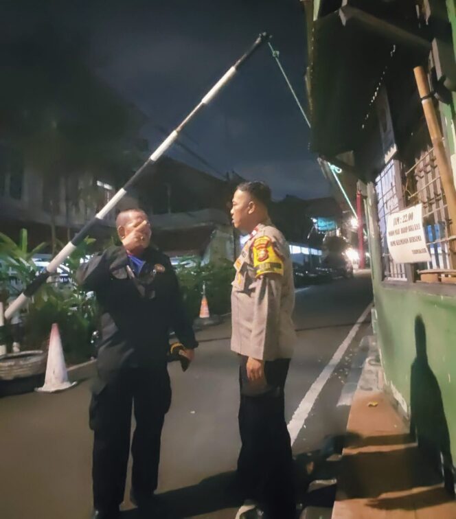 
					Jaga Keamanan Lingkungan, Bhabinkamtibmas Bendungan Hilir Cek Pos Kamling di Danau Semayang