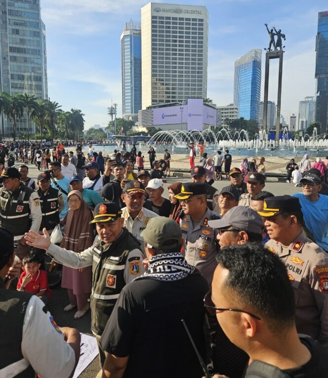 
					Pengamanan Ketat Unjuk Rasa Solidaritas Palestina di Bundaran HI Berjalan Aman di Tengah CFD