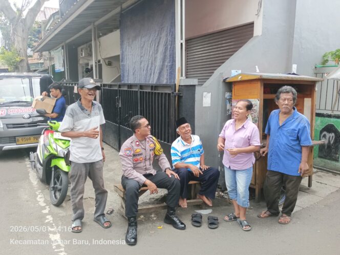 
					Cooling System dan Patroli Wilayah, Bhabinkamtibmas Ajak Warga Jaga Kondusifitas Kampung Rawa
