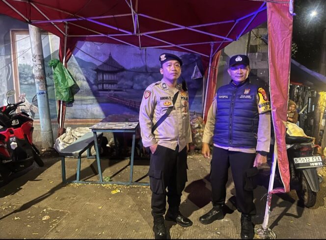 
					Perbatasan Kalipasir Dijaga Ketat, Polisi dan Warga Cegah Aksi Kriminal