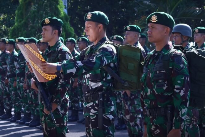 
					Danyonif 509 Kostrad Pimpin Tradisi Penerimaan Warga Baru dan Pelepasan Empat Perwira Terbaik