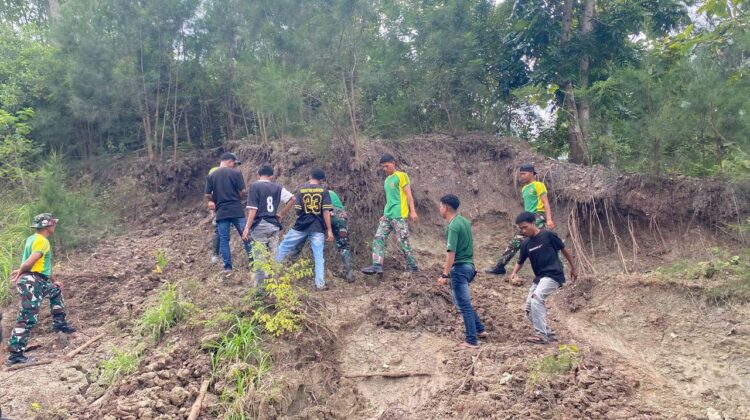 Hijaukan Batas, Tangkal Kebencanaan: Satgas Pamtas Yonarhanud 2 Kostrad dan Mahasiswa Permabi Tanam Pohon Bersama