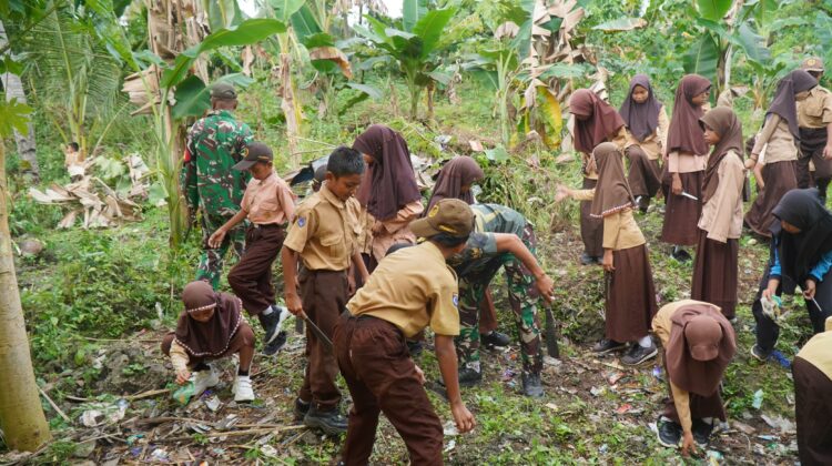 Kerja Bakti Satgas TMMD dan Siswa SDN Umbele Wujudkan Lingkungan Sekolah Bersih dan Nyaman